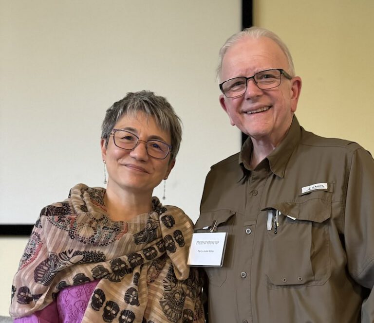 Terry poses beside Kimiko Hahn.