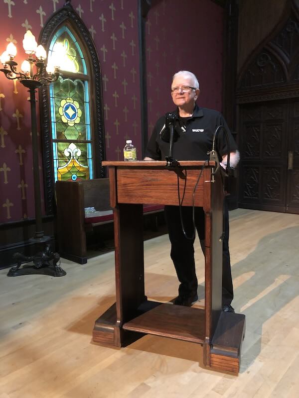 Terry reads a poem at 2023 Poetry at Round Top.