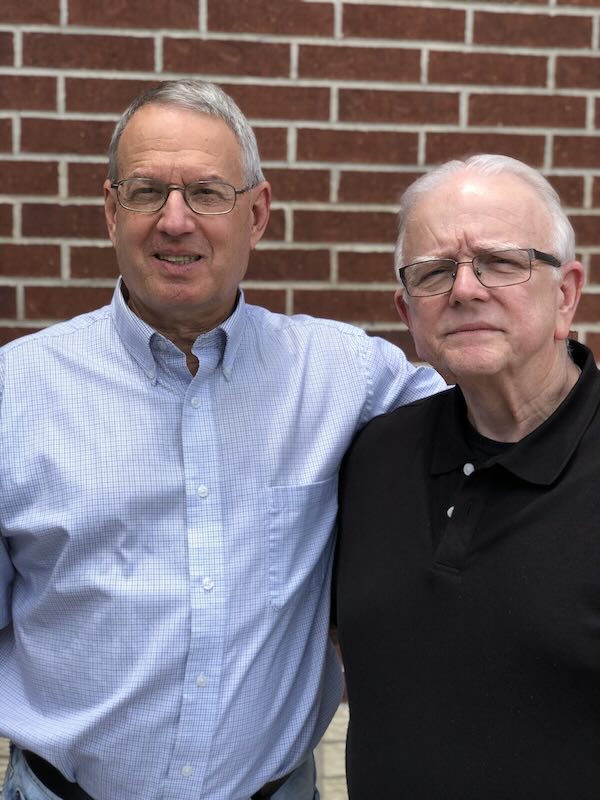 Terry poses beside Steve Schwei.